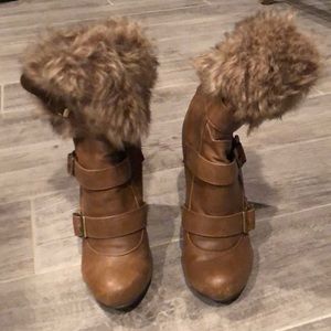 Gently used high heeled boots